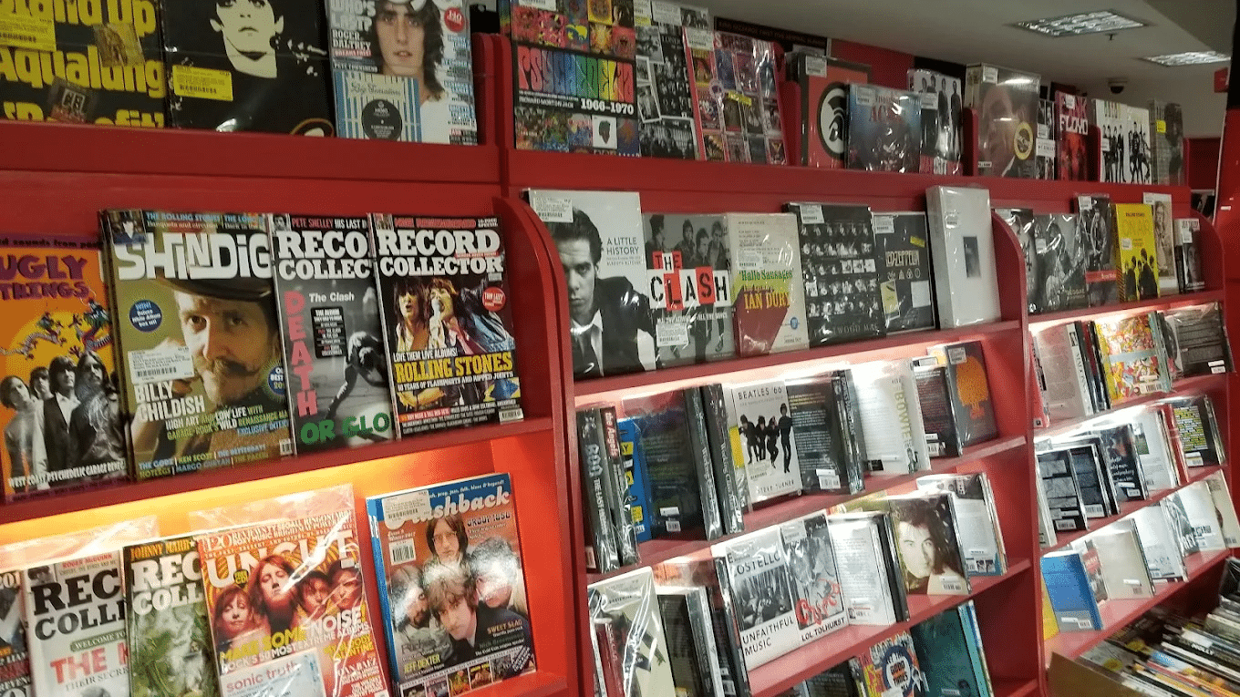 Red bookcase with magazines in Sydney music venue