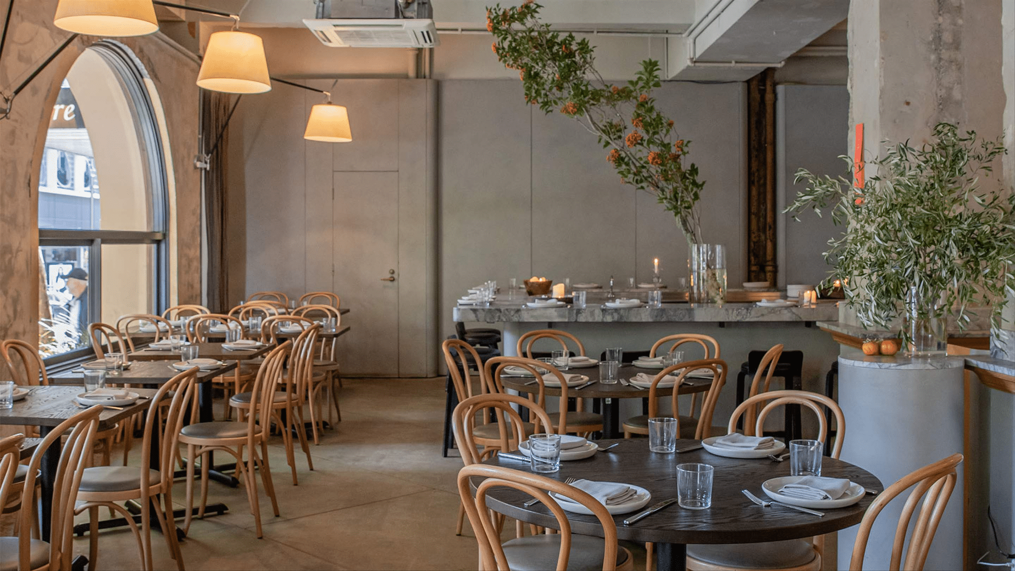 Restaurant interior in Sydney with tables, chairs, and bar