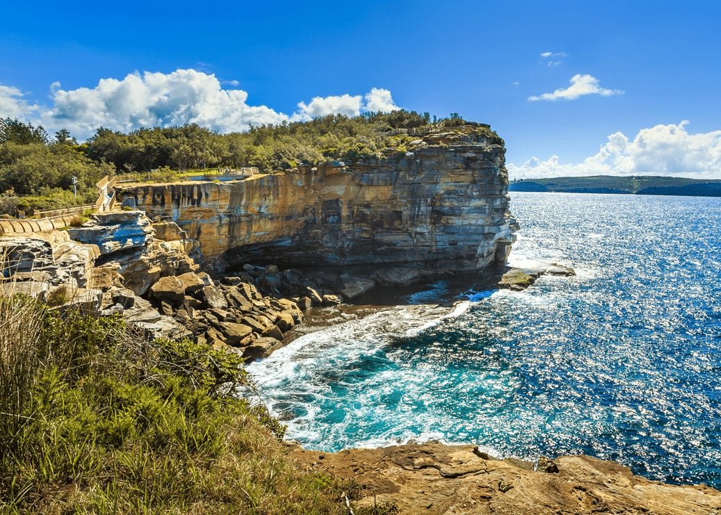 Rocky cliff overlooking water in Sydney eco tourism spot