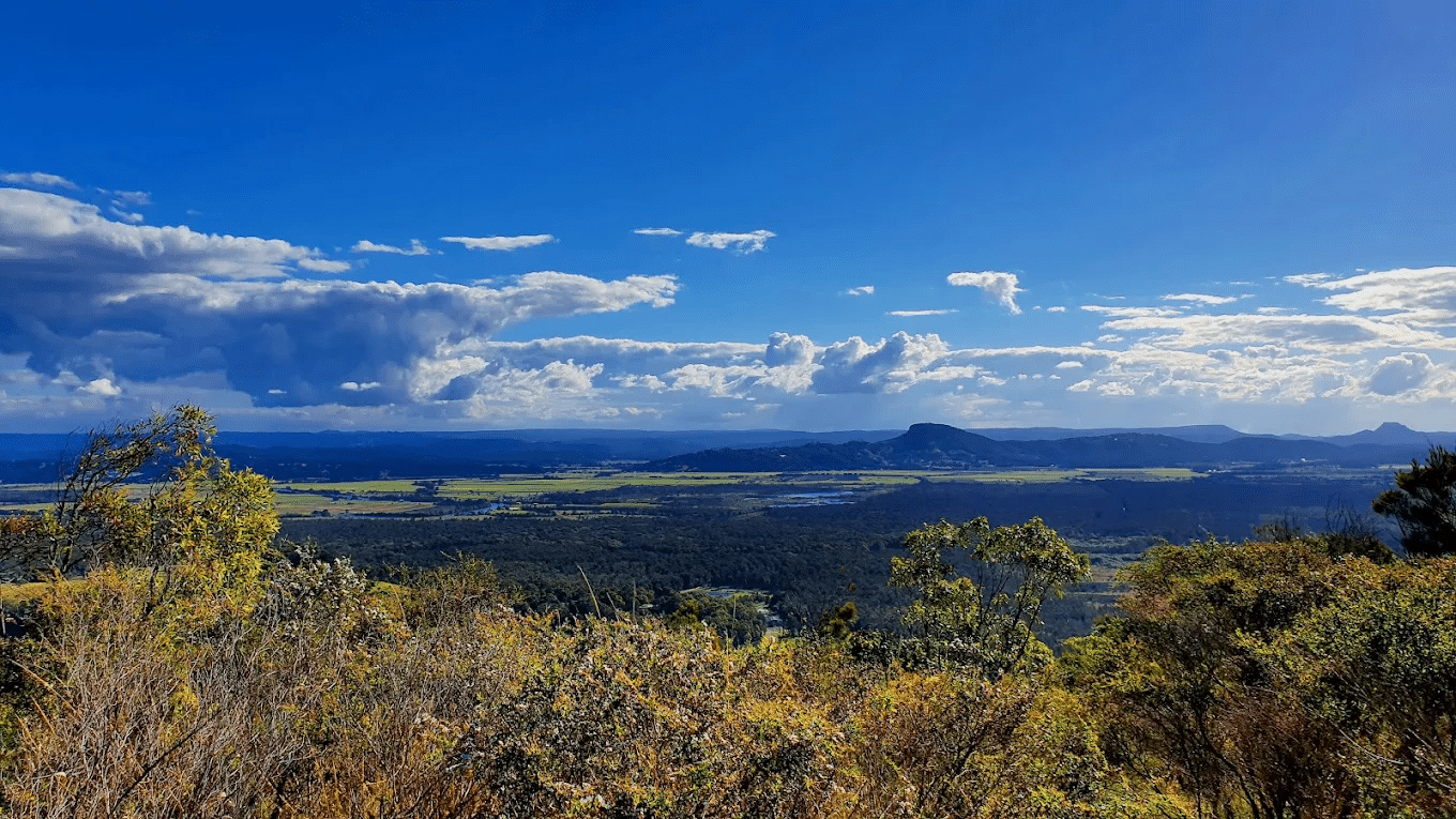Scenic valley view with distant mountains on Sunshine Coast