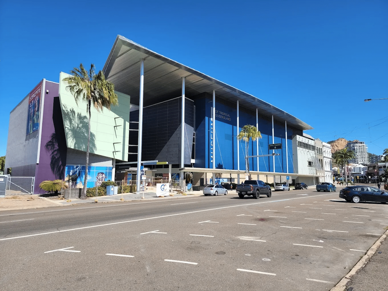 School building in Townsville with parked cars