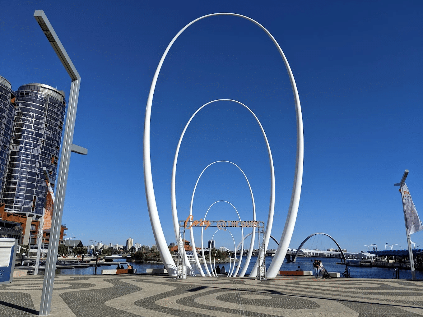 Sculpture by water on budget day trip from Perth