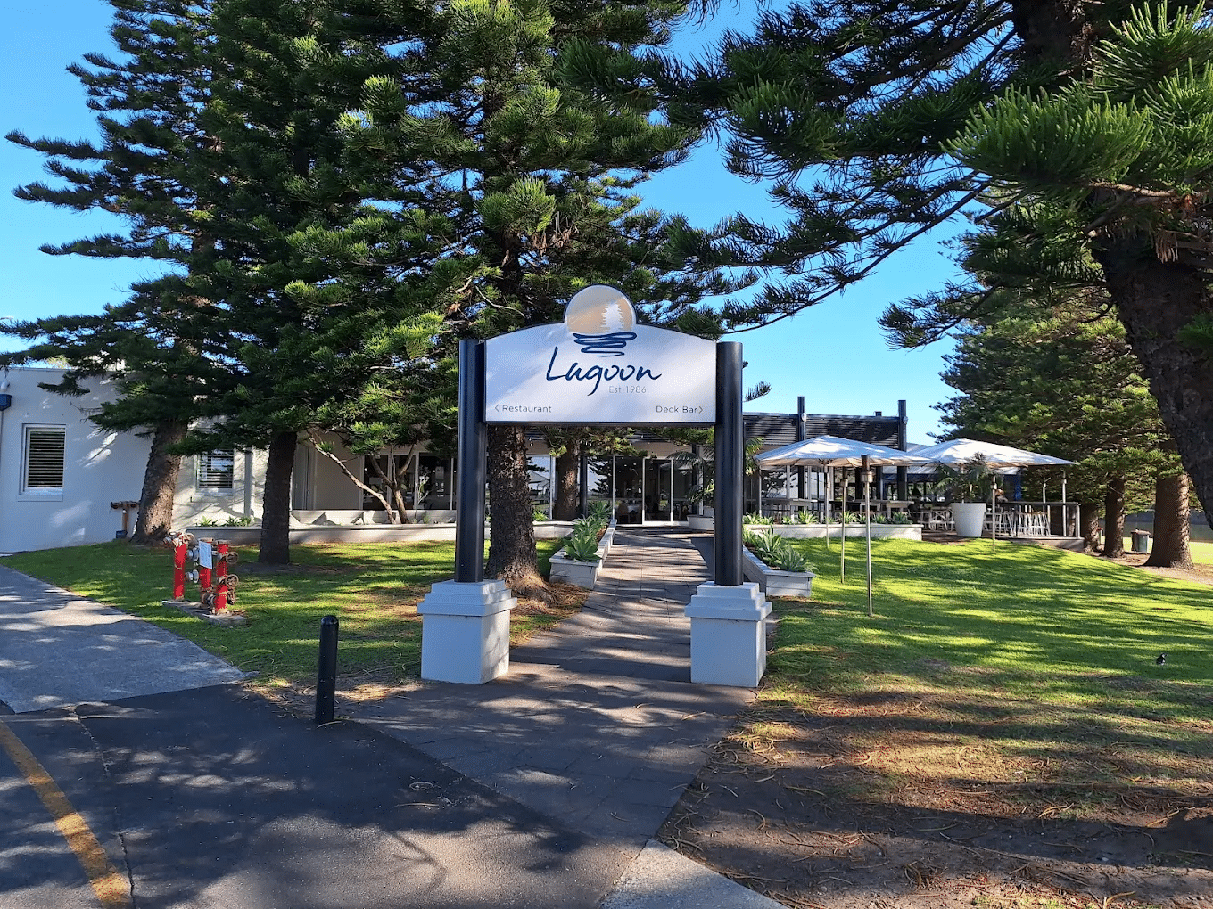 Sign among trees in Wollongong food tour