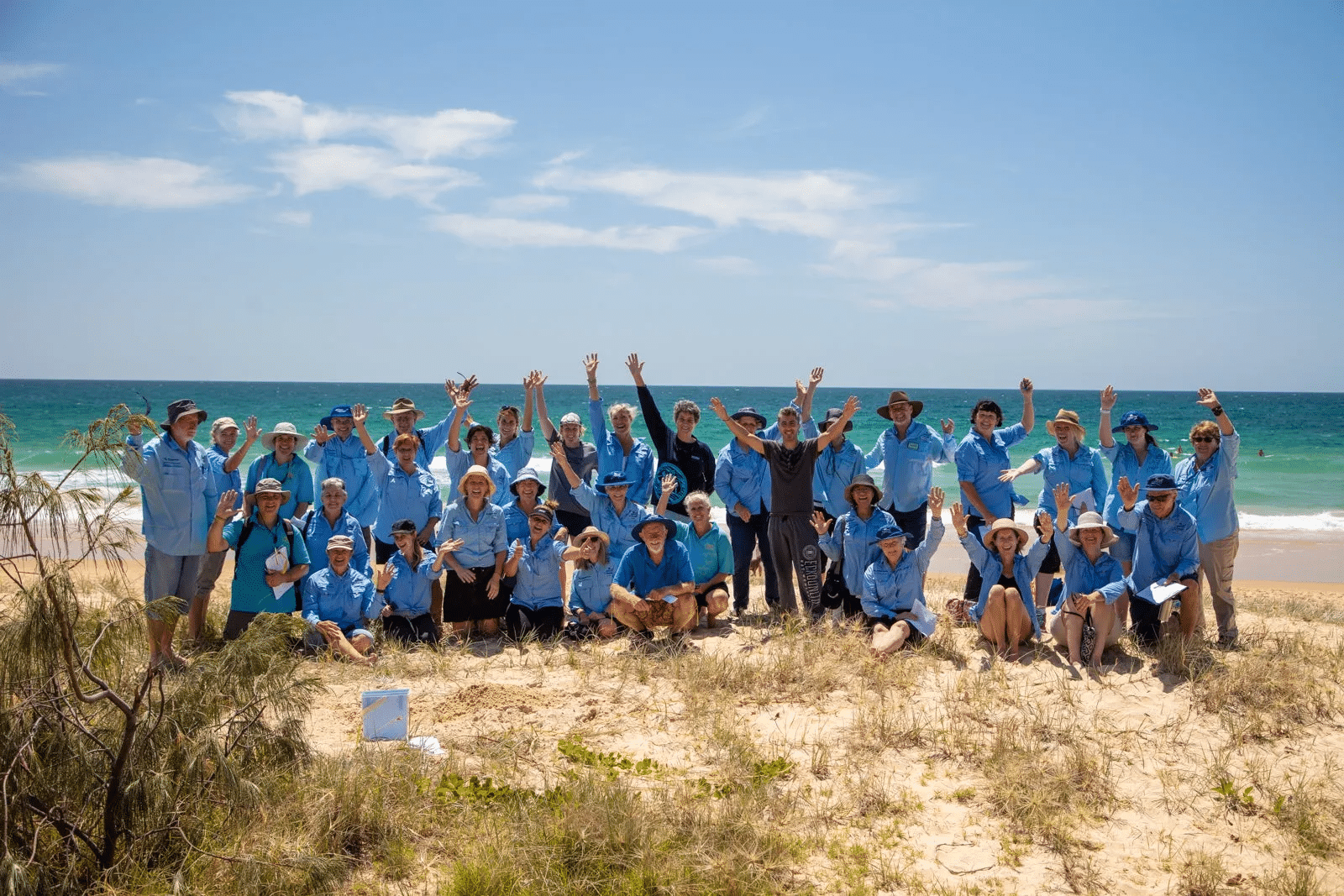 Students on sandy beach during school excursion