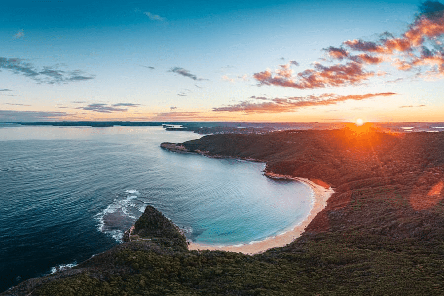 Sunset over ocean and beach in Sydney eco tourism