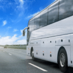 White bus traveling on highway in Melbourne