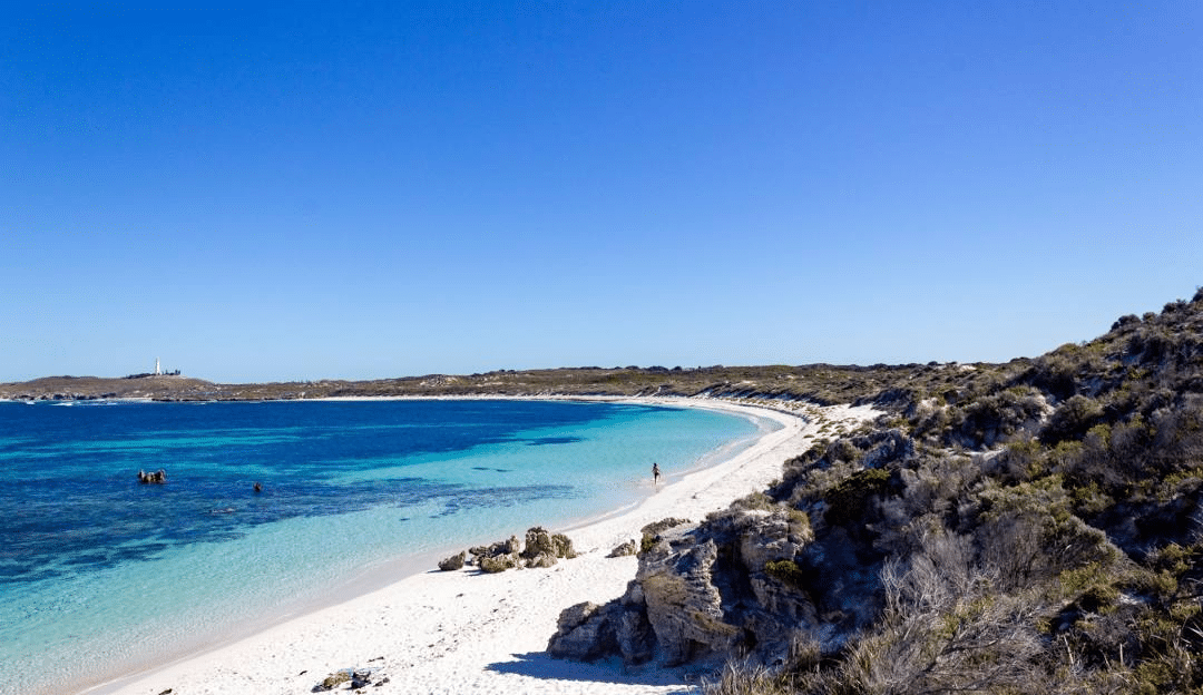 White sandy beach with clear blue water in Perth