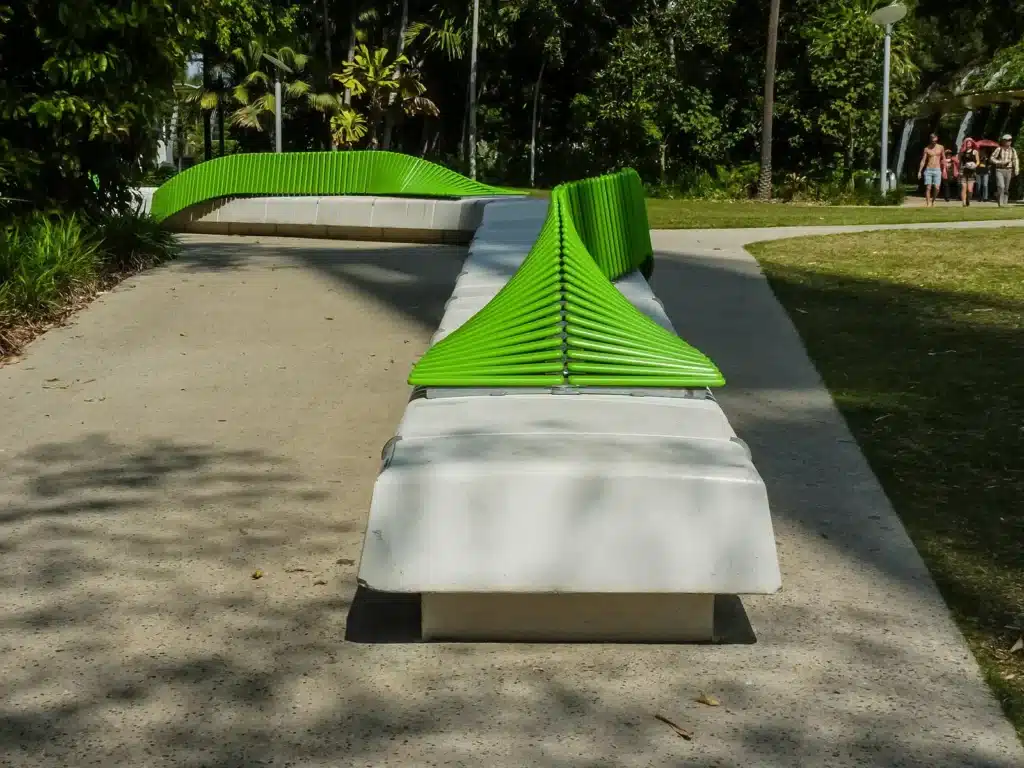 Wooden bench on a sidewalk in South Bank Parklands, Brisbane